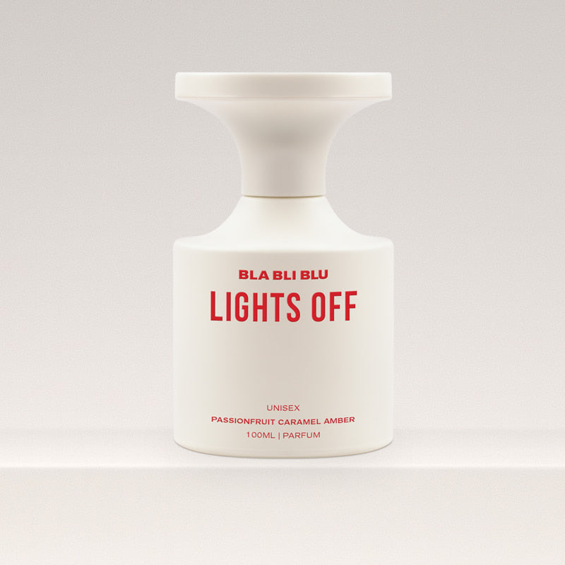 Perfume bottle labeled 'BLA BLI BLU LIGHTS OFF' on a white background