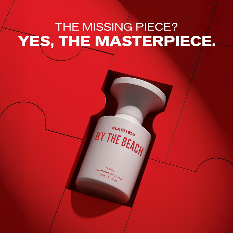 White Men Perfume bottle labeled 'By the Beach' on a red background with text 'The Missing Piece