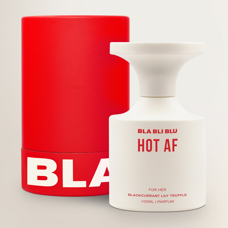 Red container and white perfume bottle with 'BLA BLU' branding on a light gray background