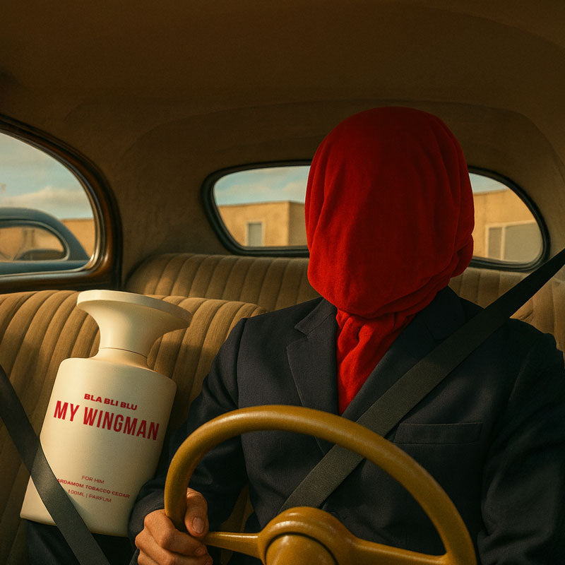 Person sitting in a car with a red headscarf, holding a Men Perfume bottle labeled 'My Wingman', with a vintage interior.
