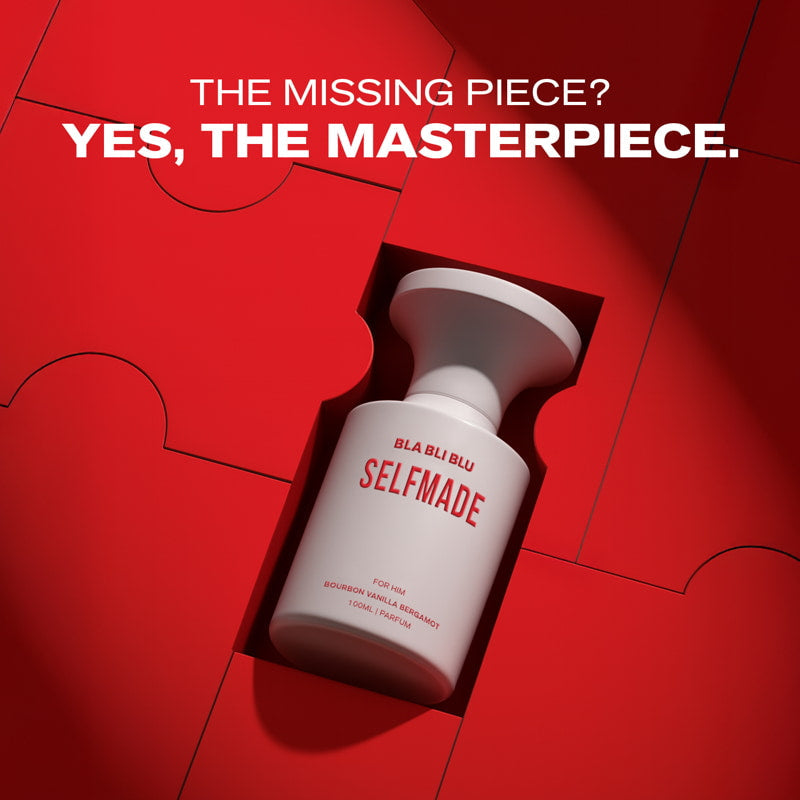 White bottle labeled 'SELFMADE' on a red background with text 'THE MISSING PIECE? YES, THE MASTERPIECE.'